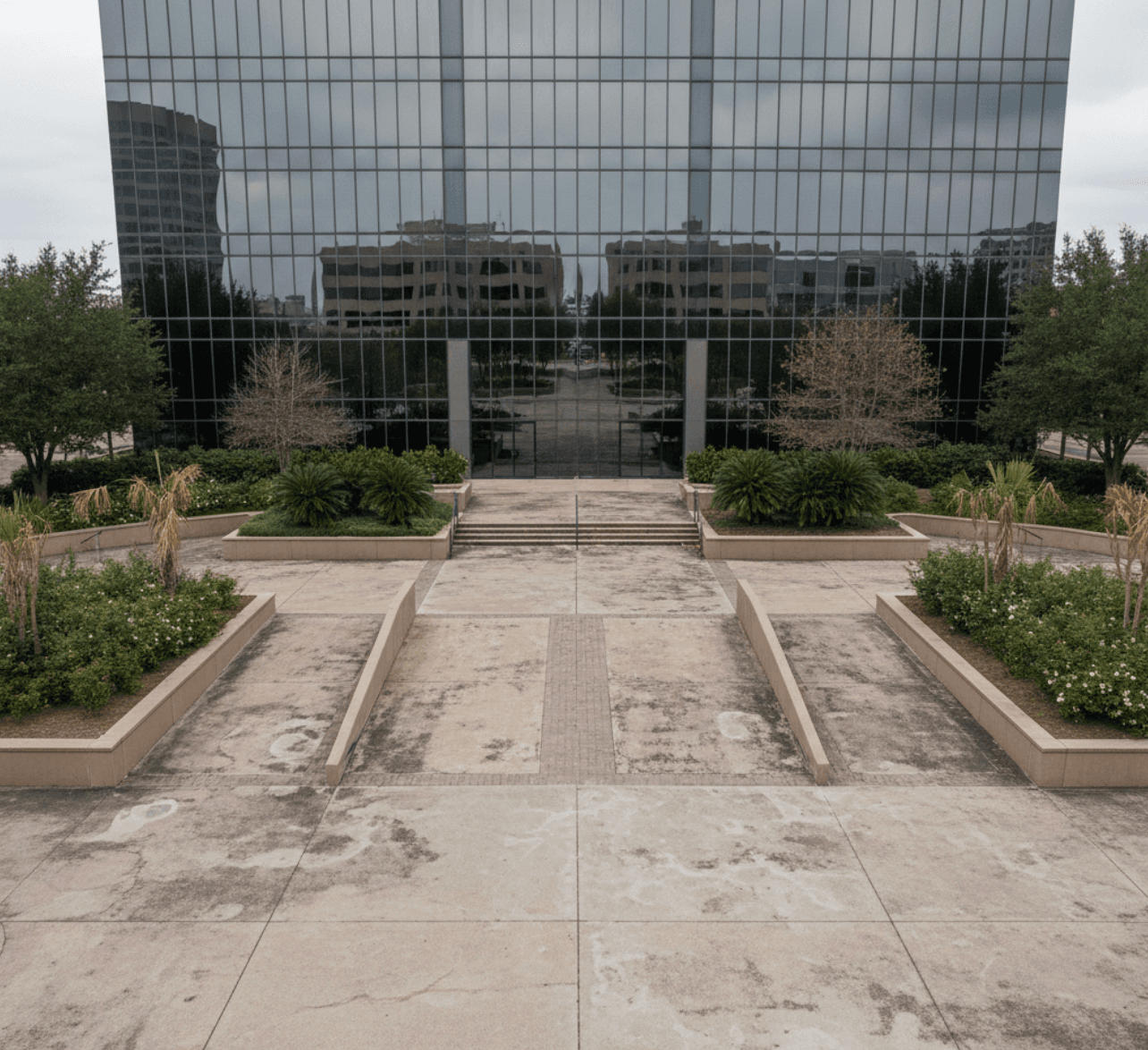 Corporate campus entry before concrete upgrade in Westchase