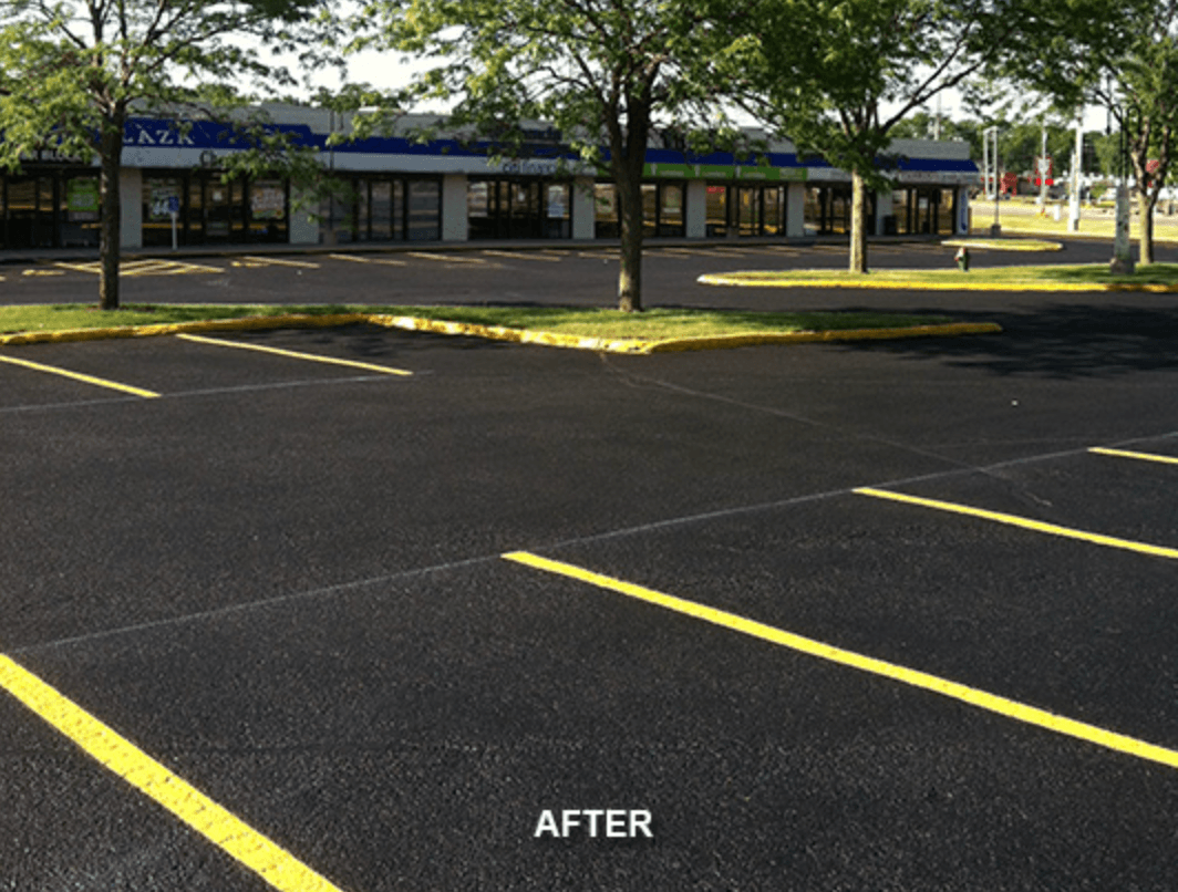 After photo of newly paved striped asphalt parking lot in Katy